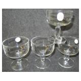 (4) Modern stemmed glasses. Measure 4.25" tall.