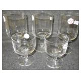 (5) Modern stemmed glasses of various sizes.
