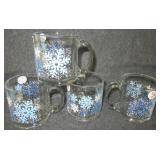 (4) Snowflake mugs. Measures 3.75" tall.