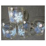 (4) Snowflake mugs. Measures 3.75" tall.