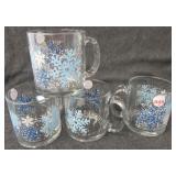 (4) Snowflake mugs. Measures 3.75" tall.