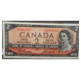 1954 Canadian $2. Crisp UNC mortified portrait.