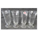 (4) Stemmed desert glasses. Measure 5.5" tall.