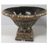 Very heavy ornate urn/planter. Measures 14.5"