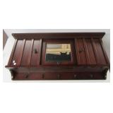 Cherry wood colored wall shelf with coat rack and