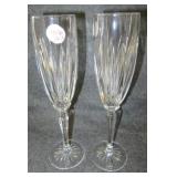 (2) Crystal stemmed Champaign glasses. Measure 9"