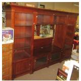 Three piece cherry wood colored entertainment