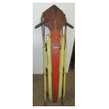 Vintage Red Rocket rail sled. Measures 55" long.