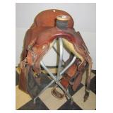 Courts 16" Western horse saddle with saddle bags.