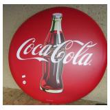 Metal Coca-Cola button sign. Measures 24" across.