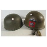 (2) Vintage metal Military Airborne helmets.