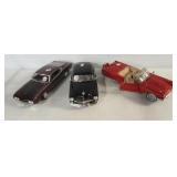 (3) 1/18 Scale die cast cars including Ertl 1949