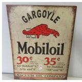Metal "Gargoyle" sign. Measures 16" x 12.5.