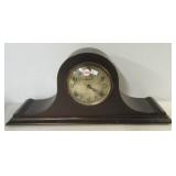 Vintage Meteor wood mantel clock. Measures 9.75"