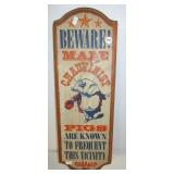 Wood "Beware Male Chauvinist" sign. Measures 21"