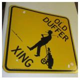 Metal Old Duffer Xing sign. Measures 18" x 18".