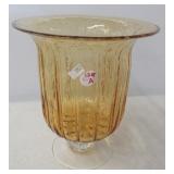 Amber glass stemmed bowl. Shows many bubble in