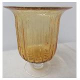 Amber glass stemmed bowl. Shows many bubble in