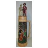 Giant beer stein with lid. Measures 34" tall.