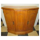 Vintage wood wall cabinet with two doors.