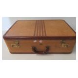 Vintage hard suitcase. Measures 14" h x 21" w x
