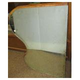 Vintage mirror with wood back. Measures 22.5" x