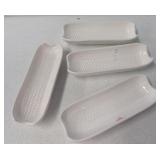 Set of (4) Ceramic corn on the hob holders.