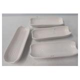 Set of (4) Ceramic corn on the hob holders.