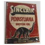 Metal "Sinclair Motor Oil" sign. Measures 16" x