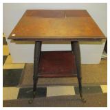 Antique parlor table with claw feet. Measures