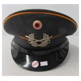 East German Military hat. Note: Has some damage.