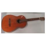 Six string acoustic guitar.