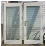 Pair of French style doors with glass panels.