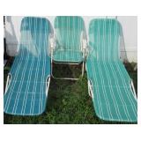 Patio lounger and (2) Folding patio chairs.