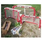 (3) Mini stick hockey goal nets and (28) Mini
