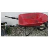 Metal wheel barrow.