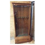 Six gun storage cabinet with sliding glass doors.