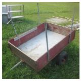 Pull behind wood utility cart.