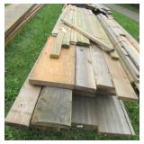 Large group of lumber including 2 x 4, 2 x 8, 2 x
