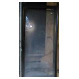 Storm door with glass panel and screen. Measures