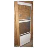 Storm door with glass and bottom screen. Measures