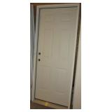 Entry door with jam and threshold. Measures 81" x
