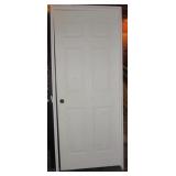 Interior door with jam. Measures 81.5" x 33".
