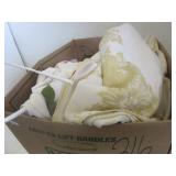 Large box full of various table cloths and other