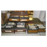 (3) VHS holders with movies.