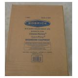 New in box stainless steel paper towel dispenser.