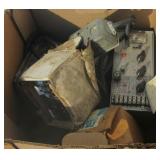 Assortment of electrical boxes and items.