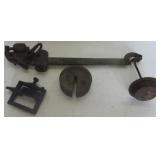 Brass scale bar with weights.