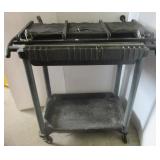 Trades Pro creeper and a rolling garage cart.