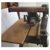 Craftsman 10" radial arm saw with stand. Works.